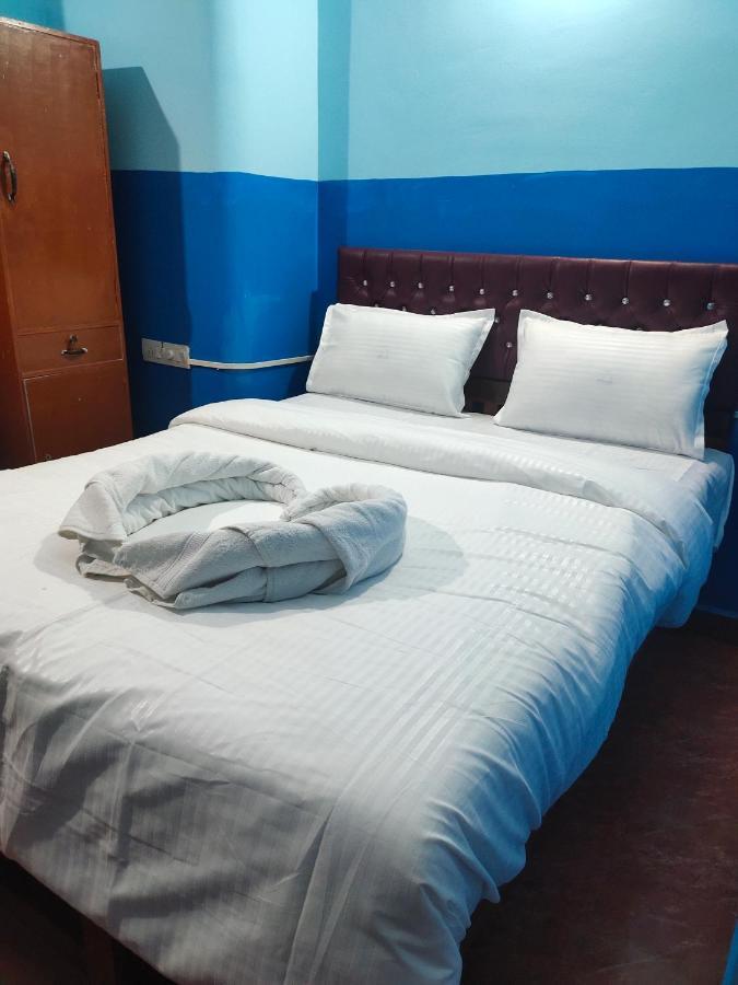 Om Baga Residency Hotel Luaran gambar