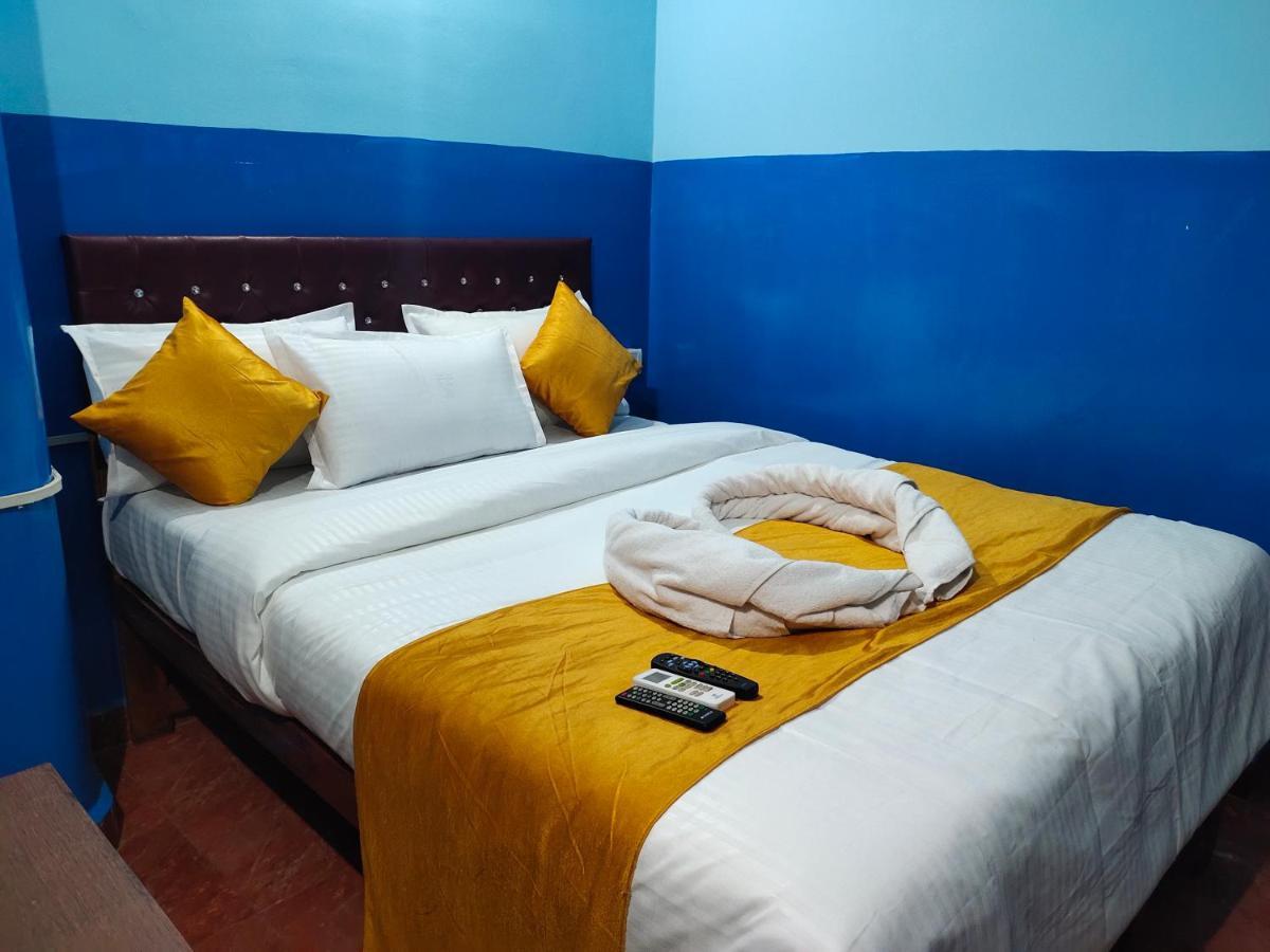 Om Baga Residency Hotel Luaran gambar